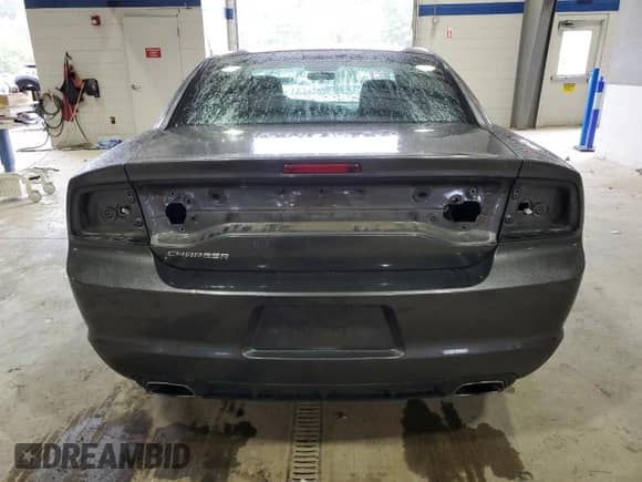 2014 Dodge Charger SE with VIN 2C3CDXBG8EH239582, listed as a Copart auction lot 90319375 with 152,015 mi miles and Salvage title. Bid and sale history available at DreamBid. Image 6.