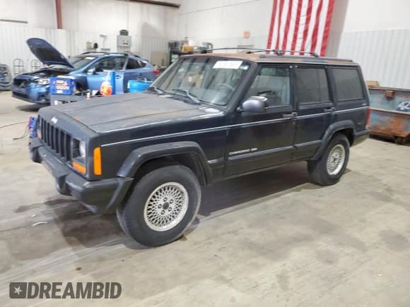 ✅ 1999 Jeep Cherokee Limited • VIN: 1J4FF78S1XL591580 • Lot: 92581565. Listed on Copart with 173,128 mi. Free auction sales archive from the USA and detailed vehicle history report at DreamBid. Image 1.