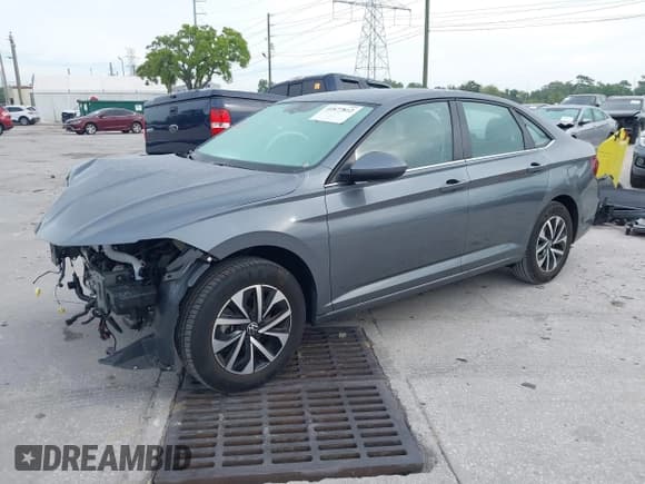 ✅ 2023 Volkswagen Jetta S • VIN: 3VW5M7BU9PM027740 • Lot: 41877812. Listed on IAAI with 8,919 mi. Free auction sales archive from the USA and detailed vehicle history report at DreamBid. Image 2.