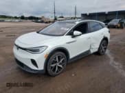 ✅ 2023 Volkswagen ID.4 Pro S • VIN: 1V2WNPE87PC038111 • Лот: 70380155. Опубликован ранее на Copart с пробегом 13 270 миль. Бесплатный доступ к архиву аукционных продаж из США и подробный отчёт об истории автомобиля на DreamBid. Изображение 1.