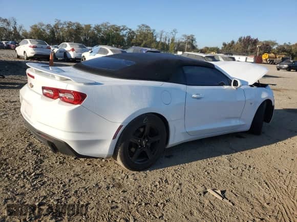 2019 Chevrolet Camaro 1LT с VIN 1G1FB3DX9K0118556, выставлен на аукционе Copart как лот 77361094 с пробегом 78 230 миль миль и Списание • Salvage title. История ставок и продаж доступна на DreamBid. Изображение 3.