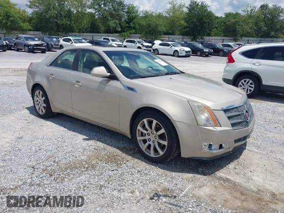 ✅ 2008 Cadillac CTS AWD • VIN: 1G6DP57V580109774 • Lot: 42373460. Wystawiony na IAAI z przebiegiem 142 520 mil. Bezpłatny archiwum sprzedaży aukcyjnych z USA i szczegółowy raport historii pojazdu na DreamBid. Zdjęcie 1.