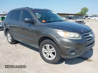 2012 Hyundai Santa Fe GLS with VIN 5XYZG3AB2CG124760, listed as a IAAI auction lot 43210891 with 186,379 mi miles and . Bid and sale history available at DreamBid. Image 1.