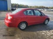 ✅ 2013 Suzuki SX4 LE • VIN: JS2YC5A32D6102814 • Лот: 81658025. Опубликован ранее на Copart с пробегом 144 343 миль. Бесплатный доступ к архиву аукционных продаж из США и подробный отчёт об истории автомобиля на DreamBid. Изображение 3.