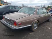 ✅ 1986 Jaguar XJ • VIN: SAJAY1344GC460998 • Лот: 41917736. Опубликован ранее на IAAI с пробегом 94 233 миль. Бесплатный доступ к архиву аукционных продаж из США и подробный отчёт об истории автомобиля на DreamBid. Изображение 4.