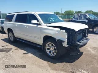 ✅ 2015 GMC Yukon XL SLT • VIN: 1GKS2HKC1FR621863 • Lot: 42672636. Listed on IAAI with 206,050 mi. Free auction sales archive from the USA and detailed vehicle history report at DreamBid. Image 1.
