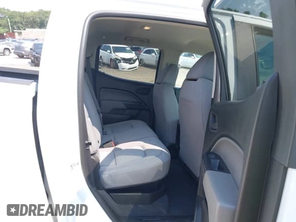 ✅ 2020 Chevrolet Colorado 4WD Work Truck • VIN: 1GCGTBEN3L1132545 • Lot: 42856502. Listed on IAAI with 86,569 mi. Free auction sales archive from the USA and detailed vehicle history report at DreamBid. Image 8.