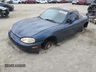 ✅ 1999 Mazda MX-5 Miata • VIN: JM1NB3534X0108667 • Lot: 84275075. Listed on Copart with 159,579 mi. Free auction sales archive from the USA and detailed vehicle history report at DreamBid. Image 1.