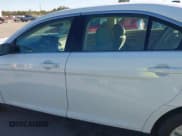 ✅ 2015 Ford Taurus SEL • VIN: 1FAHP2E8XFG182899 • Lot: 41209454. Listed on IAAI with 93,477 mi. Free auction sales archive from the USA and detailed vehicle history report at DreamBid. Image 14.