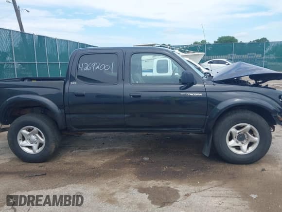 ✅ 2003 Toyota Tacoma • VIN: 5TEHN72N63Z301821 • Lot: 42692001. Listed on IAAI with 176,986 mi. Free auction sales archive from the USA and detailed vehicle history report at DreamBid. Image 13.