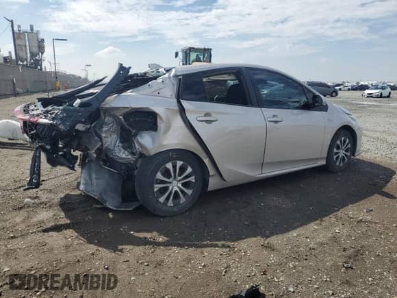 2021 Toyota Prius LE z VIN JTDKAMFP6M3186049, wystawiony jako Copart lot #81289905 z przebiegiem 271 061 mil mil oraz Szkoda całkowita • Salvage title. Historia ofert i sprzedaży dostępna na DreamBid. Obrazek 3.