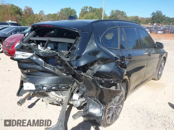 ✅ 2021 BMW X1 xDrive28i • VIN: WBXJG9C0XM5U28881 • Lot: 43518155. Listed on IAAI with 27,307 mi. Free auction sales archive from the USA and detailed vehicle history report at DreamBid. Image 4.