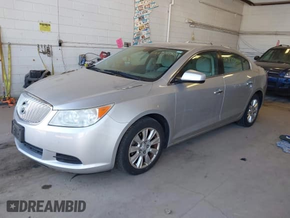✅ 2012 Buick LaCrosse • VIN: 1G4GA5ER4CF307328 • Lot: 41871503. Listed on IAAI with 111,386 mi. Free auction sales archive from the USA and detailed vehicle history report at DreamBid. Image 2.