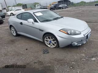 2008 Hyundai Tiburon GT с VIN KMHHN66F98U291391, выставлен на аукционе IAAI как лот 42330142 с пробегом 135 953 миль миль и . История ставок и продаж доступна на DreamBid. Изображение 1.