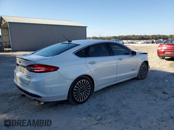 ✅ 2017 Ford Fusion Hybrid Titanium • VIN: 3FA6P0RUXHR249774 • Lot: 92848715. Listed on Copart with 114,397 mi. Free auction sales archive from the USA and detailed vehicle history report at DreamBid. Image 3.