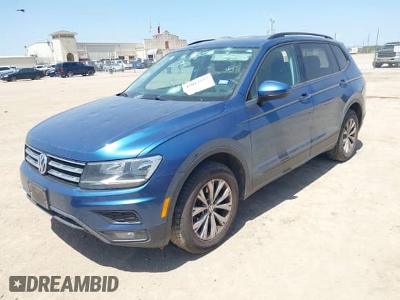 ✅ 2018 Volkswagen Tiguan S • VIN: 3VV0B7AXXJM015331 • Lot: 42012557. Listed on IAAI with 80,288 mi. Free auction sales archive from the USA and detailed vehicle history report at DreamBid. Image 17.