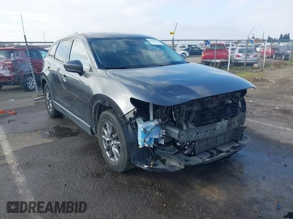 ✅ 2021 Mazda CX-9 Touring • VIN: JM3TCBCYXM0501850 • Lot: 43786266. Listed on IAAI with 42,453 mi. Free auction sales archive from the USA and detailed vehicle history report at DreamBid. Image 1.