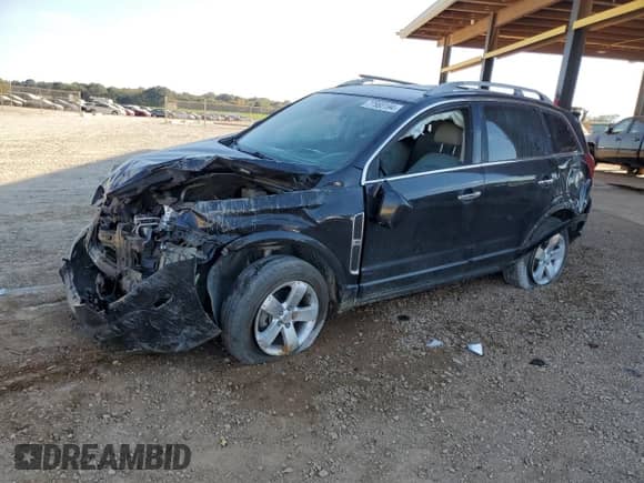 2012 Chevrolet Captiva Sport LTZ z VIN 3GNFL4E54CS650466, wystawiony jako Copart lot #77980194 z przebiegiem 137 236 mil mil oraz Szkoda całkowita • Salvage title. Historia ofert i sprzedaży dostępna na DreamBid. Obrazek 1.