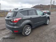 ✅ 2018 Ford Escape SE • VIN: 1FMCU9GD9JUB18987 • Lot: 40912957. Wystawiony na IAAI z przebiegiem 110 279 mil. Bezpłatny archiwum sprzedaży aukcyjnych z USA i szczegółowy raport historii pojazdu na DreamBid. Zdjęcie 4.