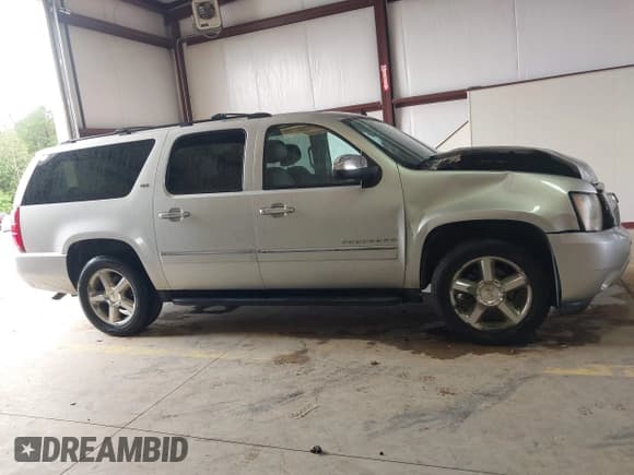 ✅ 2011 Chevrolet Suburban LTZ • VIN: 1GNSKKE3XBR173001 • Lot: 42959263. Wystawiony na IAAI z przebiegiem 167 679 mil. Bezpłatny archiwum sprzedaży aukcyjnych z USA i szczegółowy raport historii pojazdu na DreamBid. Zdjęcie 12.