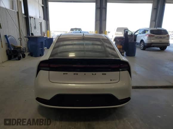 2024 Toyota Prius Limited with VIN JTDADABU9R3017082, listed as a Copart auction lot 85710085 with 9,983 mi miles and Salvage title. Bid and sale history available at DreamBid. Image 6.