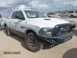 ✅ 2016 Ram 1500 Rebel • VIN: 1C6RR7YT9GS200370 • Lot: 43536064. Listed on IAAI with 148,184 mi. Free auction sales archive from the USA and detailed vehicle history report at DreamBid. Image 1.