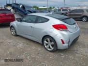 ✅ 2014 Hyundai Veloster • VIN: KMHTC6AD8EU182891 • Lot: 42363105. Wystawiony na IAAI z przebiegiem 182 073 mil. Bezpłatny archiwum sprzedaży aukcyjnych z USA i szczegółowy raport historii pojazdu na DreamBid. Zdjęcie 3.