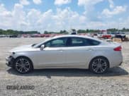 ✅ 2019 Ford Fusion Titanium • VIN: 3FA6P0K94KR253669 • Лот: 42861475. Опубликован ранее на IAAI с пробегом 88 617 миль. Бесплатный доступ к архиву аукционных продаж из США и подробный отчёт об истории автомобиля на DreamBid. Изображение 14.