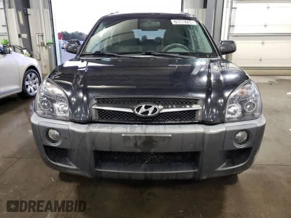 2009 Hyundai Tucson SE with VIN KM8JN12D79U114445, listed as a Copart auction lot 76508704 with 162,112 mi miles and Salvage title. Bid and sale history available at DreamBid. Image 5.