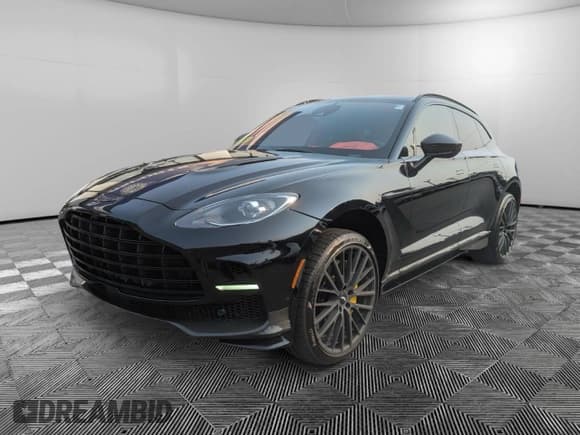 ✅ 2023 Aston Martin DBX 707 • VIN: SD7VUJBWXPTV06039 • Lot: 90390785. Wystawiony na Copart z przebiegiem 9 477 mil. Bezpłatny archiwum sprzedaży aukcyjnych z USA i szczegółowy raport historii pojazdu na DreamBid. Zdjęcie 2.