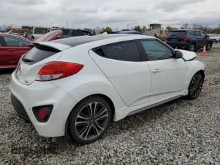 ✅ 2016 Hyundai Veloster Turbo • VIN: KMHTC6AE8GU286552 • Lot: 80307554. Wystawiony na Copart z przebiegiem 102 997 mil. Bezpłatny archiwum sprzedaży aukcyjnych z USA i szczegółowy raport historii pojazdu na DreamBid. Zdjęcie 3.