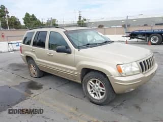 ✅ 1999 Jeep Grand Cherokee Limited • VIN: 1J4GW68N9XC533452 • Лот: 43256422. Опубликован ранее на IAAI с пробегом Не указан. Бесплатный доступ к архиву аукционных продаж из США и подробный отчёт об истории автомобиля на DreamBid. Изображение 1.