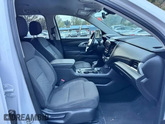 ✅ 2021 Chevrolet Traverse LT Cloth • VIN: 1GNERGKWXMJ233252 • Лот: 90199225. Опубликован ранее на Copart с пробегом 124 379 миль. Бесплатный доступ к архиву аукционных продаж из США и подробный отчёт об истории автомобиля на DreamBid. Изображение 5.