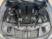 ✅ 2015 BMW 7 Series 750i xDrive • VIN: WBAYB6C5XFD965910 • Lot: 47488765. Listed on Copart with 173,486 mi. Free auction sales archive from the USA and detailed vehicle history report at DreamBid. Image 14.