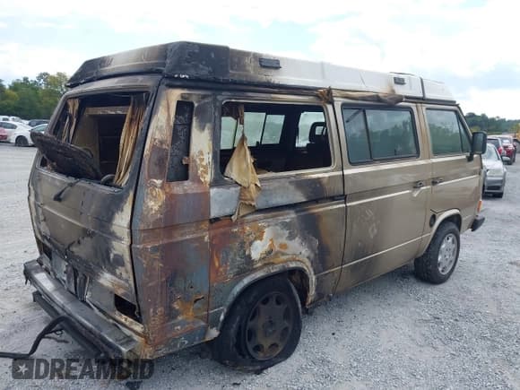 ✅ 1985 Volkswagen Vanagon • VIN: WV2XB0254FH087429 • Lot: 43128578. Listed on IAAI with Not provided. Free auction sales archive from the USA and detailed vehicle history report at DreamBid. Image 6.