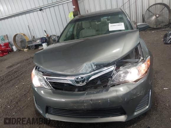 ✅ 2014 Toyota Camry LE • VIN: 4T4BF1FKXER390239 • Lot: 43062805. Listed on IAAI with 123,686 mi. Free auction sales archive from the USA and detailed vehicle history report at DreamBid. Image 12.