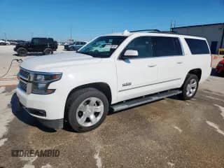 2019 Chevrolet Suburban LT with VIN 1GNSCHKC9KR168327, listed as a Copart auction lot 61773615 with 163,309 mi miles and Clean title. Bid and sale history available at DreamBid. Image 1.