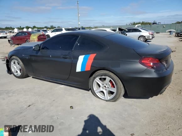 ✅ 2012 BMW 6 Series 650i xDrive • VIN: WBALX5C59CC894335 • Lot: 87297754. Listed on Copart with 84,508 mi. Free auction sales archive from the USA and detailed vehicle history report at DreamBid. Image 2.