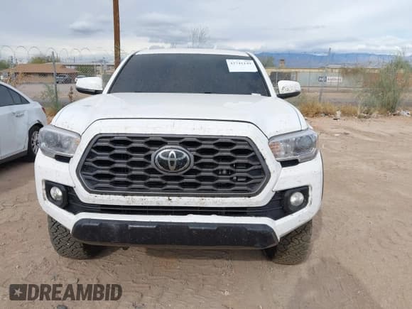 ✅ 2022 Toyota Tacoma TRD Sport • VIN: 3TYCZ5AN6NT099703 • Lot: 43741149. Listed on IAAI with 52,272 mi. Free auction sales archive from the USA and detailed vehicle history report at DreamBid. Image 12.