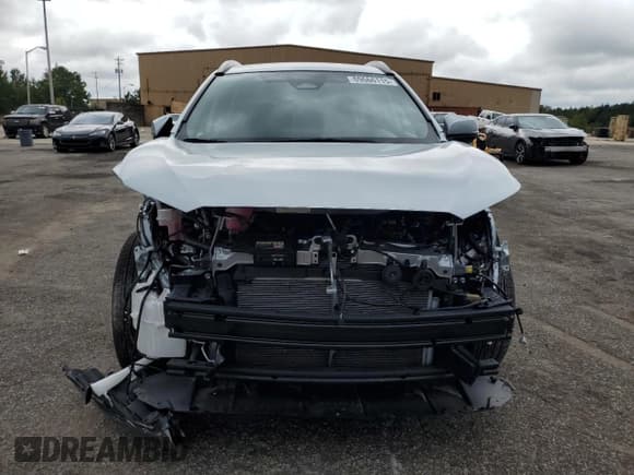 ✅ 2023 Toyota Corolla Cross Hybrid S • VIN: 7MUFBABG9PV009474 • Lot: 69666115. Wystawiony na Copart z przebiegiem 12 804 mil. Bezpłatny archiwum sprzedaży aukcyjnych z USA i szczegółowy raport historii pojazdu na DreamBid. Zdjęcie 5.