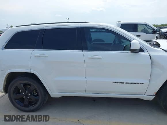 ✅ 2015 Jeep Grand Cherokee Laredo • VIN: 1C4RJEAG7FC104893 • Lot: 43009030. Listed on IAAI with 128,500 mi. Free auction sales archive from the USA and detailed vehicle history report at DreamBid. Image 14.