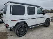 ✅ 2024 Mercedes-Benz G 63 AMG • VIN: W1NYC7HJ7RX507748 • Лот: 84663444. Опубликован ранее на Copart с пробегом 87 миль. Бесплатный доступ к архиву аукционных продаж из США и подробный отчёт об истории автомобиля на DreamBid. Изображение 3.