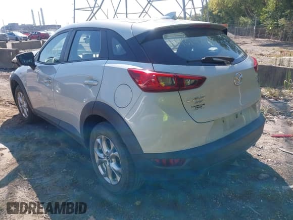 ✅ 2016 Mazda CX-3 Touring • VIN: JM1DKBC73G0111698 • Lot: 43142783. Listed on IAAI with 92,102 mi. Free auction sales archive from the USA and detailed vehicle history report at DreamBid. Image 3.
