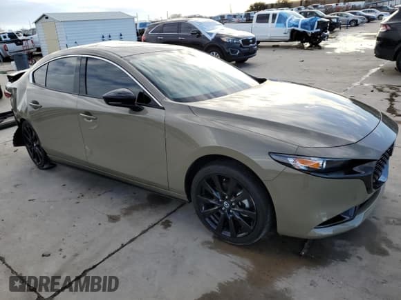 ✅ 2024 Mazda 3 Carbon Edition • VIN: 3MZBPBXYXRM412283 • Lot: 89314175. Listed on Copart with Not provided. Free auction sales archive from the USA and detailed vehicle history report at DreamBid. Image 4.