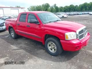 2007 Dodge Dakota SLT z VIN 1D7HW48N17S128373, wystawiony jako IAAI lot #42633897 z przebiegiem 129 780 mil mil oraz . Historia ofert i sprzedaży dostępna na DreamBid. Obrazek 1.