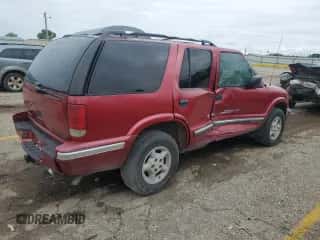 2000 Chevrolet Blazer LS with VIN 1GNDT13W3Y2133969, listed as a Copart auction lot 72696734 with 223,251 mi miles and Salvage title. Bid and sale history available at DreamBid. Image 3.