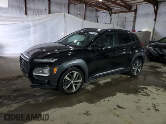 ✅ 2019 Hyundai Kona Ultimate • VIN: KM8K5CA54KU329734 • Lot: 91737215. Listed on Copart with 103,273 mi. Free auction sales archive from the USA and detailed vehicle history report at DreamBid. Image 1.