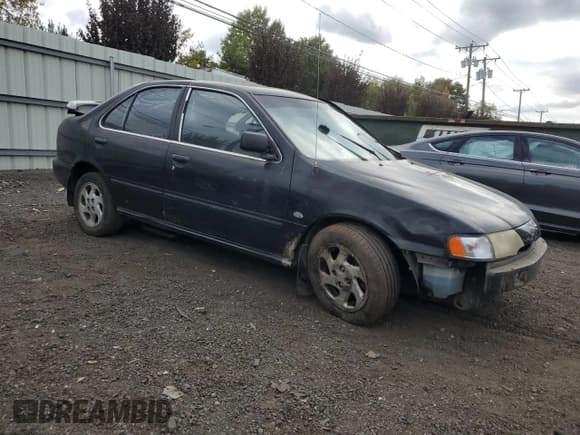 ✅ 1999 Nissan Sentra XE • VIN: 1N4AB41D0XC720162 • Лот: 74484174. Опубликован ранее на Copart с пробегом 186 031 миль. Бесплатный доступ к архиву аукционных продаж из США и подробный отчёт об истории автомобиля на DreamBid. Изображение 4.