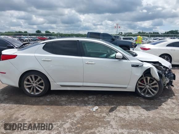 ✅ 2014 Kia Optima SXL Turbo • VIN: 5XXGR4A69EG282658 • Лот: 42345853. Опубликован ранее на IAAI с пробегом 133 483 миль. Бесплатный доступ к архиву аукционных продаж из США и подробный отчёт об истории автомобиля на DreamBid. Изображение 13.