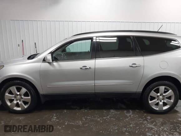 ✅ 2013 Chevrolet Traverse LTZ • VIN: 1GNKVLKDXDJ139698 • Lot: 43635000. Wystawiony na IAAI z przebiegiem 133 377 mil. Bezpłatny archiwum sprzedaży aukcyjnych z USA i szczegółowy raport historii pojazdu na DreamBid. Zdjęcie 14.